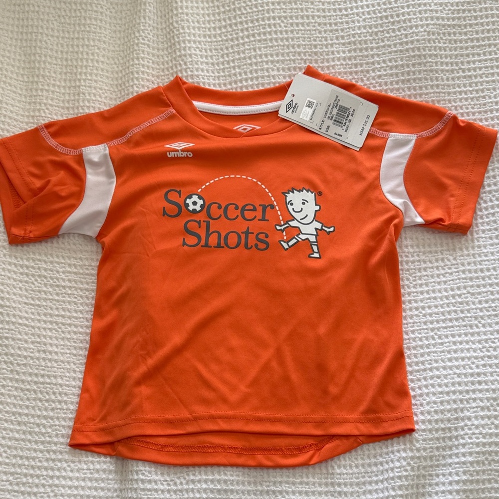 Umbro Kids NWT Orange Soccer Shots Graphic Tee with White Accents size small